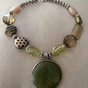 Striking Green and Silver Necklace with Circular Pendant and Eclectic Beads